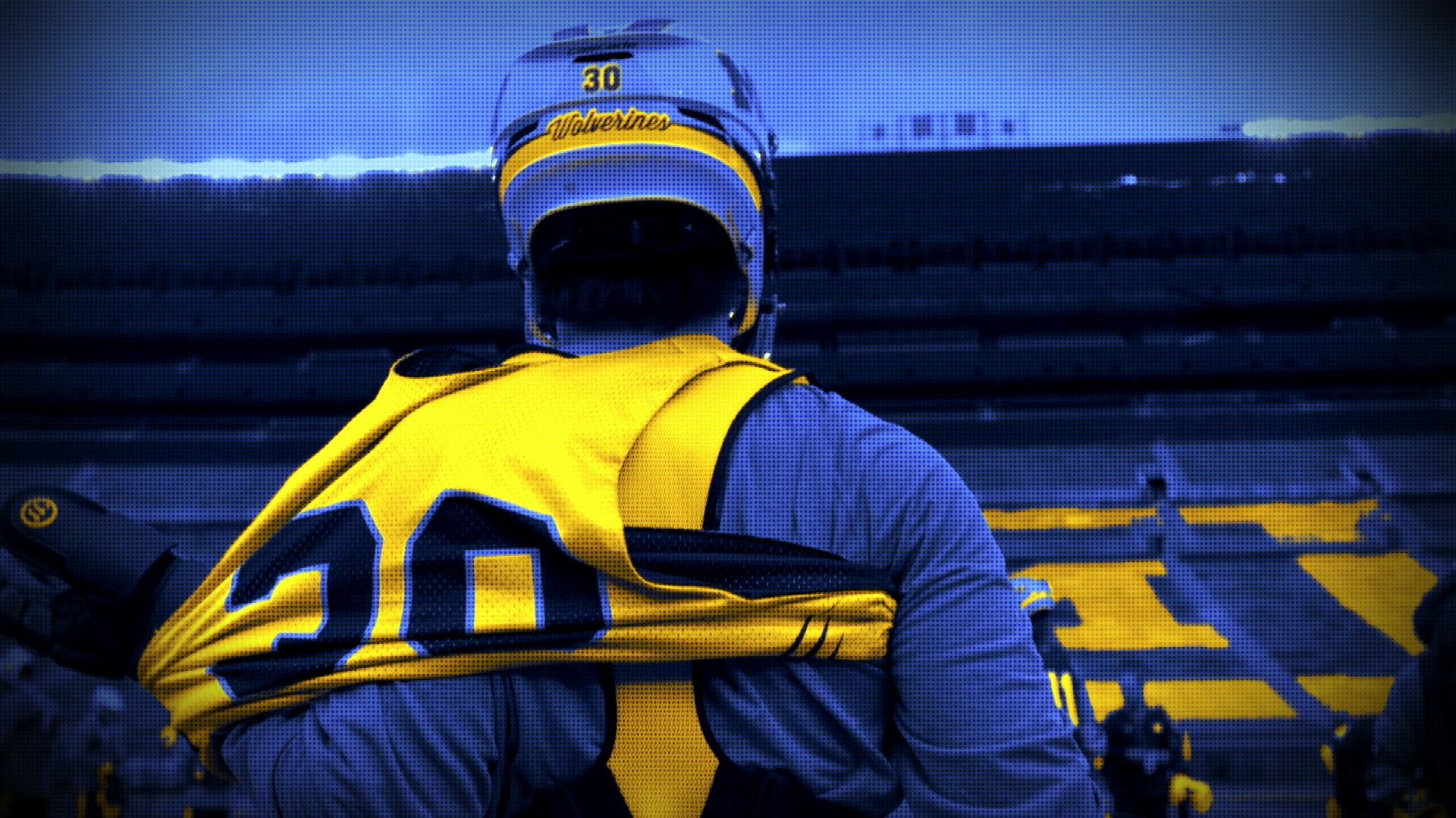 Michigan men’s lacrosse player in the stadium before training